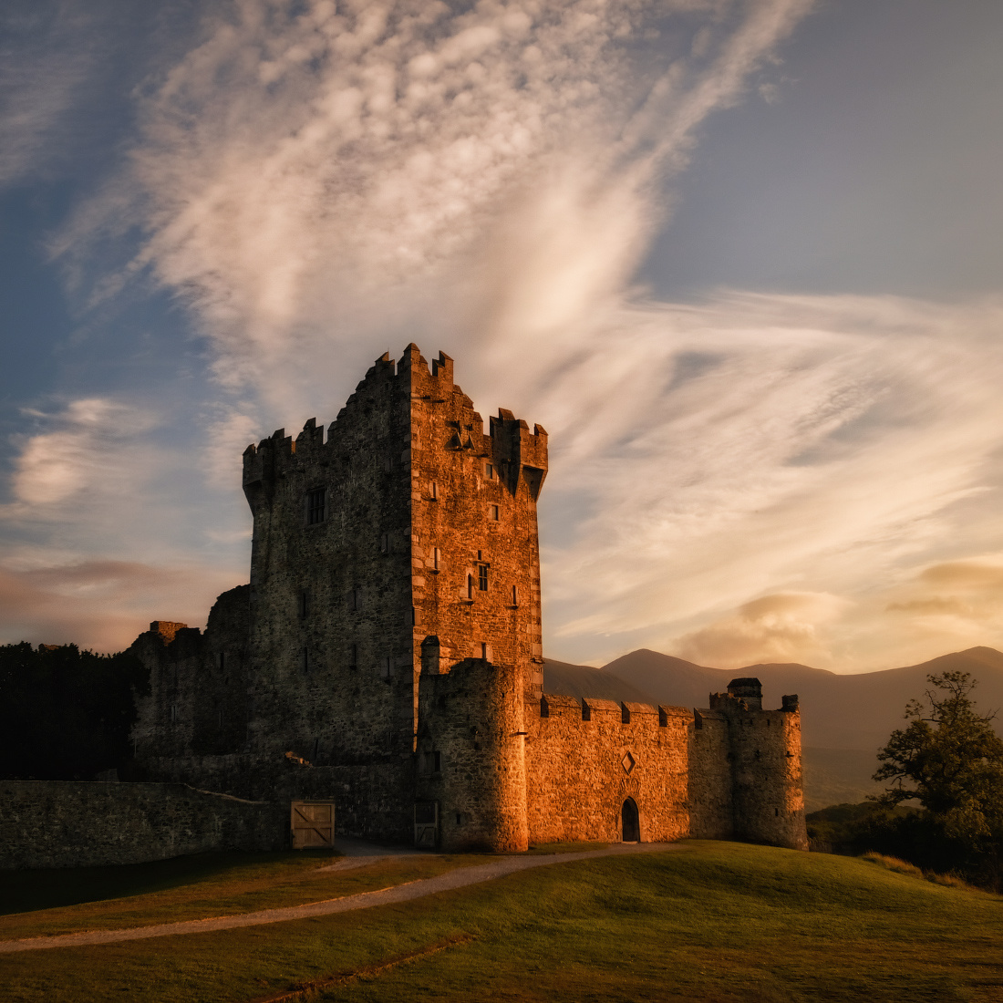 ...Ross castle... ireland kerry killarney ross castle sunset mountains landscape architechture old history ancientmfortress tower stone sky clouds cloudscape outdoors scenic scenery dramatic picturesque europe