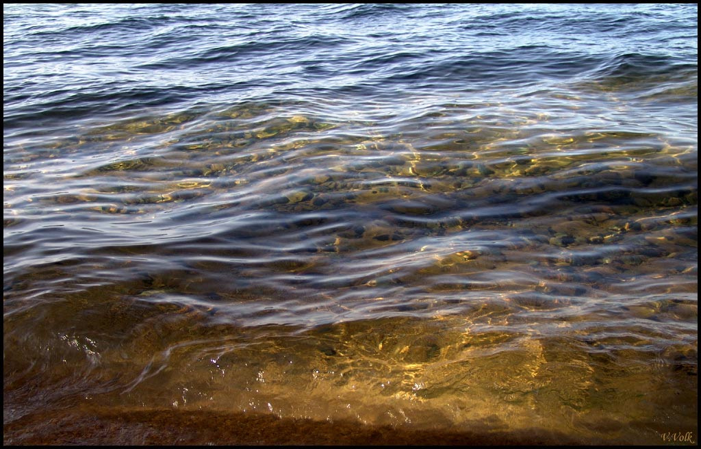 Вода и свет озеро Тахо горы солнце